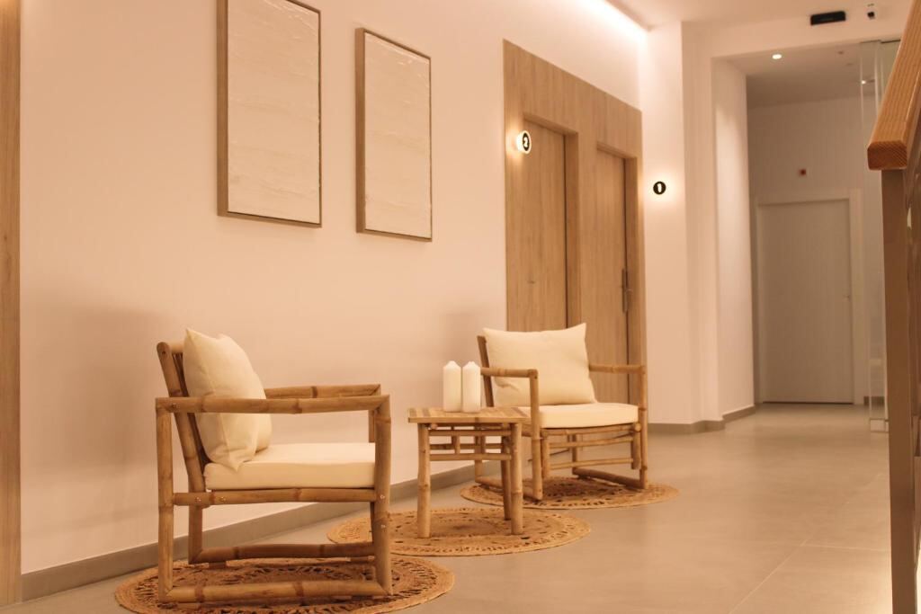 Bright lounge corridor with bamboo armchairs